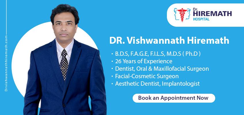 designation of the top full-mouth dental implant specialist, Dr. Vishwannath Hiremath in Bangalore